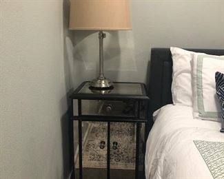 Matching Black bedside tables with mirrored glass