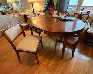 Dining room table with leaf, table pads and 6 chairs