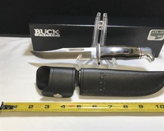 Lot34 Buck "Skinner" Certificate of Authenticity
COA, serial #13/100, chip flint 420HC steel blade, handle is smooth Buffalo Horn with a nickel silver deer head, leather black sheath, blade is engraved "Chuck Buck '09" his signature also appears twice on COA 1 printed other ball point pen signed "Chuck Buck'09".
