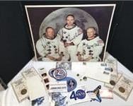 Lot 262  Memorabilia- NASA - Poster of Apollo 11 Astronauts
Neil Armstrong, Buzz Aldrin and Michael Collins, Shuttle Crew Emblems, pins and patches.
