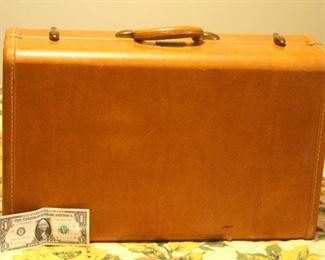 Vintage Brown Suitcase https://www.texasonlineauctionhouse.com/
