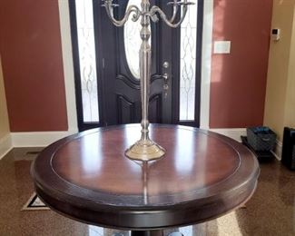 Round entry table 47". Candelabra 22"w x 39"h w/o candles
