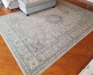 7'10" x 11'2" floor rug. Grey/cream.    
Made of Heatset Polypropyline (soft fibers that are resistant to wear and tear and repel stains.)