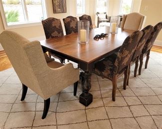 Walter E. Smithe dining table.  Table was custom made - distressed top 92" x 48" (plus 2 leafs) Base is ebony washed. Will come with six upholstered chairs. Wingback chairs on ends are separate.