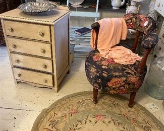 Antique hook rug
Bark cloth chair
Small chest