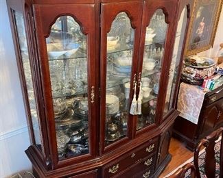Seating for 10 with China cabinet, by Sumter Cabinet Company furniture. Table includes foldable fitted pad. Two removable leaves.