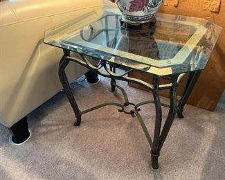 Side table. Heavy iron frame, beveled glass top x2 . Spare top included. 