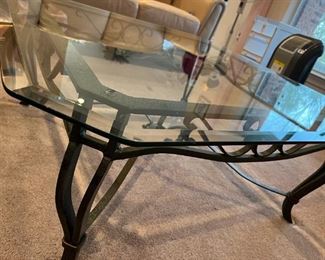 Coffee table. Heavy iron frame, beveled glass top x2 . 