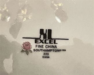 Excel Fine China South Hampton pattern 223. Five piece per setting, 18 settings, includes serving bowls and coffee service. 