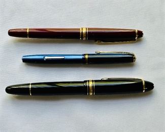 Montblanc 585 burgundy  fountain pen 14K nib (top); Montblanc 166 black document marker (bottom)