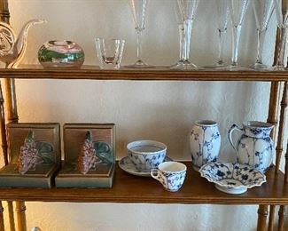 Nice crystal, pottery and glassware throughout (much signed); selection of Royal Copenhagen; Roseville bookends; sterling silverware.