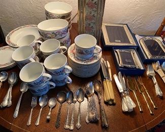 Set of Block Spal “Whimsy Christmas” dinnerware; large selection of silverplate flatware; sterling silver picture frames by Carrs, in original boxes.