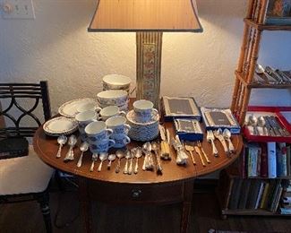 Drop-leaf table by Baker Furniture; ornate lamp with porcelain/pottery base.