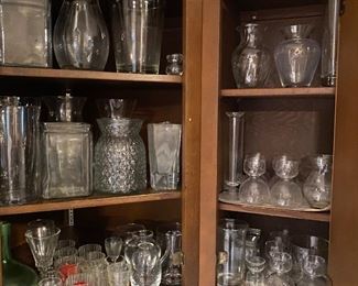 Many glass vases, candleholders, drinking glasses in various styles, and more.