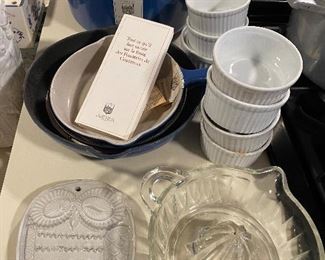 Cousances (France) enameled cast iron lidded pot and three skillets.