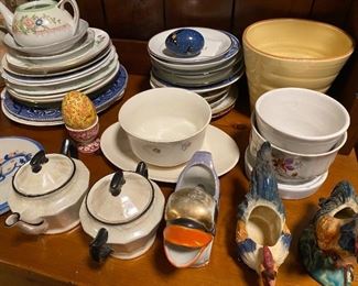 Many pieces of vintage china and pottery.