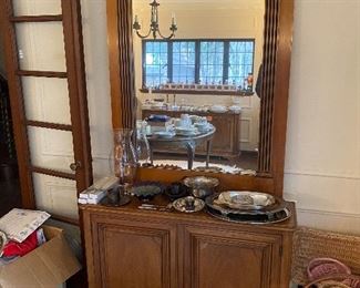 Antique cabinet with mirror.