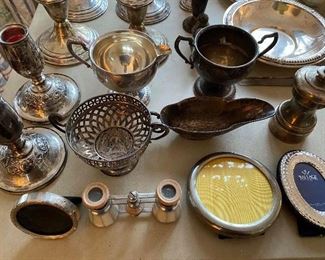 Large selection of sterling silver candlesticks, serving pieces, picture frames, and more; mother-of-pearl opera glasses.