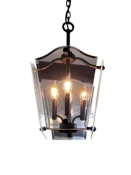 $170 USD     Hinkley Lighting Colonial 4 Light Indoor Bronze Pendant Chandelier CH165-8      Description: Classic lantern styling in an old world Bronze finish. Listing is for 1 chandelier.  We have 3 available.  Antique bronze finish.  Ambient lighting.  Colonial.   
Dimensions:  16 x 28"H
Condition: Pre owned. Used in very good condition.
Location: Local pick up Lake Oswego, OR. Shipper suggestions available upon request.       https://goodbyhello.com/products/copy-of-wagon-wheel-black-and-crystal-6-light-chandelier-ch165-7?_pos=13&_sid=5bbb39c90&_ss=r