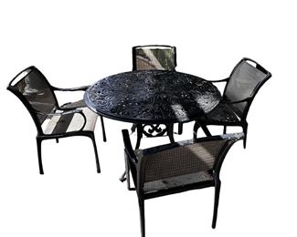 $950 USD    Outdoor Cast Aluminum Dining Set with 4 Chairs MM179-35    Description: The 5 piece dining set is a beautiful addition whether in your garden, patio, or courtyard. Crafted from cast aluminum, each piece sports a powder-coated black finish that wards off wear from weather and UV without any maintenance.  Cushions are included for each seat, ensuring that your family and guests stay comfortable throughout the meal. This set features an open beautiful scroll design that highlights its elegant hand-crafted details.
Dimensions: Table: 47.5 x 47.5 x 29H in  |  Chairs: 23.5 x 19 x 36H in
Condition: Used and in very good condition.
Location: Local pick up Lake Oswego, OR. Shipper suggestions available upon request. Located on back outside patio.     https://goodbyhello.com/products/copy-of-pair-of-metal-chaise-lounge-chairs-mm179-34?_pos=10&_sid=410c006b7&_ss=r