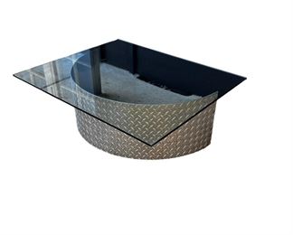 $75 USD        Modern Diamond Plate Glass Top Coffee Table Indoor/Outdoor LB151-11     Description: Artisan made and an easy keeper!  This is a heavy duty piece for in or outdoors.  The diamond plate base resists rust and the elements perfect for the Pacific Northwest!  Glass top is a hearty 1/2 in thick further adding to it's substantial nature.

Dimensions:  36 x 30 x 12.5 in

Condition: It is in very good functional condition. There are minimal signs of wear commensurate with age and use. Please see photo's for mor details. 

Location: Lake Oswego, OR Garage location for easy access.  Contact us for shipper suggestions      https://goodbyhello.com/products/copy-of-antique-oak-wood-frame-mirror-w-gold-acanthus-carved-inlay-lb151-10?_pos=1&_sid=3bdb7eabf&_ss=r
