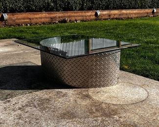 $75 USD        Modern Diamond Plate Glass Top Coffee Table Indoor/Outdoor LB151-11     Description: Artisan made and an easy keeper!  This is a heavy duty piece for in or outdoors.  The diamond plate base resists rust and the elements perfect for the Pacific Northwest!  Glass top is a hearty 1/2 in thick further adding to it's substantial nature.

Dimensions:  36 x 30 x 12.5 in

Condition: It is in very good functional condition. There are minimal signs of wear commensurate with age and use. Please see photo's for mor details. 

Location: Lake Oswego, OR Garage location for easy access.  Contact us for shipper suggestions      https://goodbyhello.com/products/copy-of-antique-oak-wood-frame-mirror-w-gold-acanthus-carved-inlay-lb151-10?_pos=1&_sid=3bdb7eabf&_ss=r