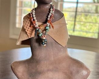 Candy Caldwell Native American Woman Clay Figurine	8 x 6 x 3in	

