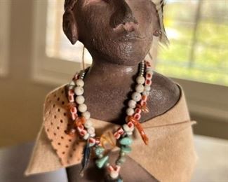 Candy Caldwell Native American Woman Clay Figurine	8 x 6 x 3in	
