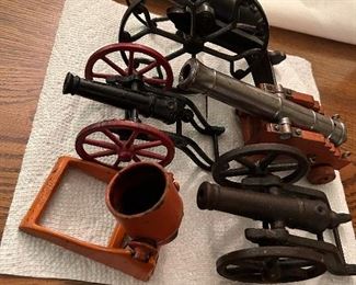 Orange-Kilgore Fire Cracker cannon,    Middle left - from a toy soldier set,          Top - Toy Signal cannon circa 1915,       Middle right - 45 cal. miniature cannon & it actually works!!!                                   Lower right- J&E Stevens signal cannon circa early 1900s.