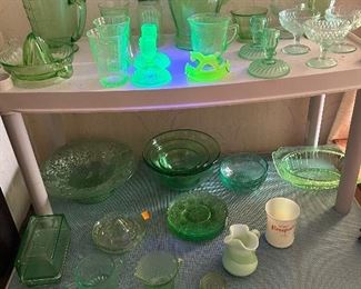 Quite a few green Depression Glass with a touch of uranium. All that is pictured glow under the black light!!