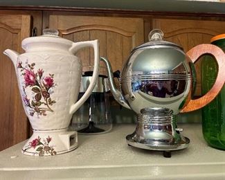 On the left -Sakura electric perulator On the right - Art Deco stainless steel electric tea kettle w/ wood handle.