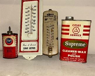 Boys oil tin, Duffy brothers from Columbus thermometer, Blackhawk Pontiac-Chevrolet Fort Atkinson thermometer and a Cities Supreme polish tin.