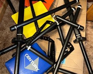 A variety of Revgear practice self defense/offense items including nunchucks, swords, kick away boards…
