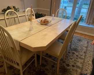 . . . love this dining room table and six chairs in ivory