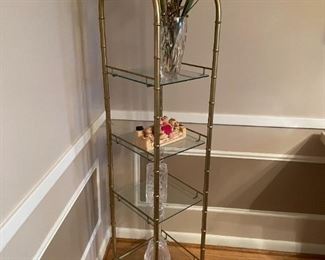 . . . open shelving unit with Waterford crystal