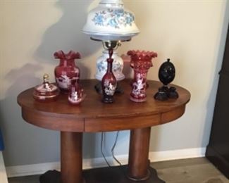 Empire oval library table, Mary Gregory pieces and Gone with the Wind lamp