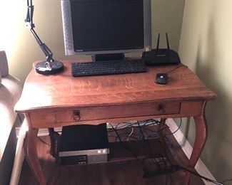 Library Desk, Dell computer,  Compaq monitor, keyboard and mouse, desk lamp
