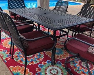 Hampton Bay 7 piece outdoor patio set with cushions. Outdoor rug measures 78 x 114