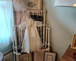 White wrought iron crib 