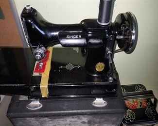 Antique featherweight sewing machine
By Singer