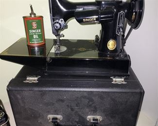 Antique featherweight
miniature sewing machine
By Singer