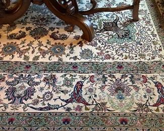 Tabriz
Persian silk area rug 
The Tabriz Persian rug is characterized by its beautiful central medallion.
L 11ft 8” x W 8ft 4”