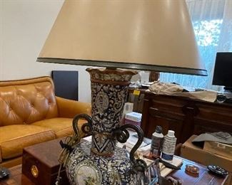 Majolica antique vase turned into a lamp with a gorgeous high quality parchment shade custom made.
Renaissance style 