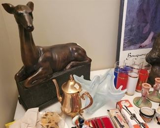 Large deer sitting approx 3' tall x 2' wide