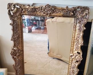 Ornate gold framed mirror approx 4.5' tall x 3' wide