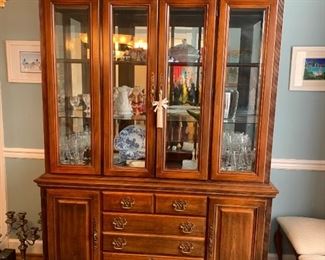 #17	American Drew China Cabinet w/3 Beveled Glass Top Doors w/lighted Top w/3 drawers * 2 Shelves w/2 glass Shelves - 60x19x33-89	 $275.00 

