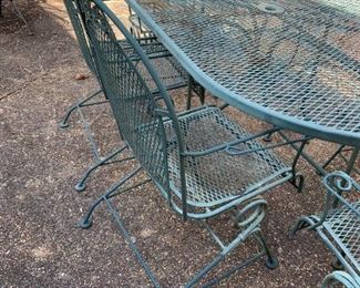 #51	Green Wrought Iron Oval Table w/6 Bouncy Chairs - 66x38x29	 $275.00 
