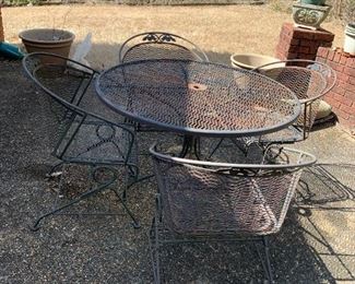 #52	Black Wrought Round Table w/4 bouncy Chairs - 42Round x 29	 $175.00 
