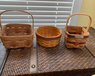 #94	longaberger basket  3 small baskets (2) with handles 1 w/ red green strips 	 $40.00 
