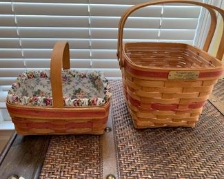 #96	Longaberger baskets (2) red stripped baskets with handles (1) with fabric liner 	 $35.00 
